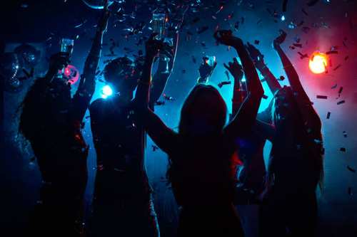 Guests celebrating at a Nightfall event
